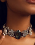 Oxidized silver choker necklace featuring a peacock motif with semi-precious stone accents.