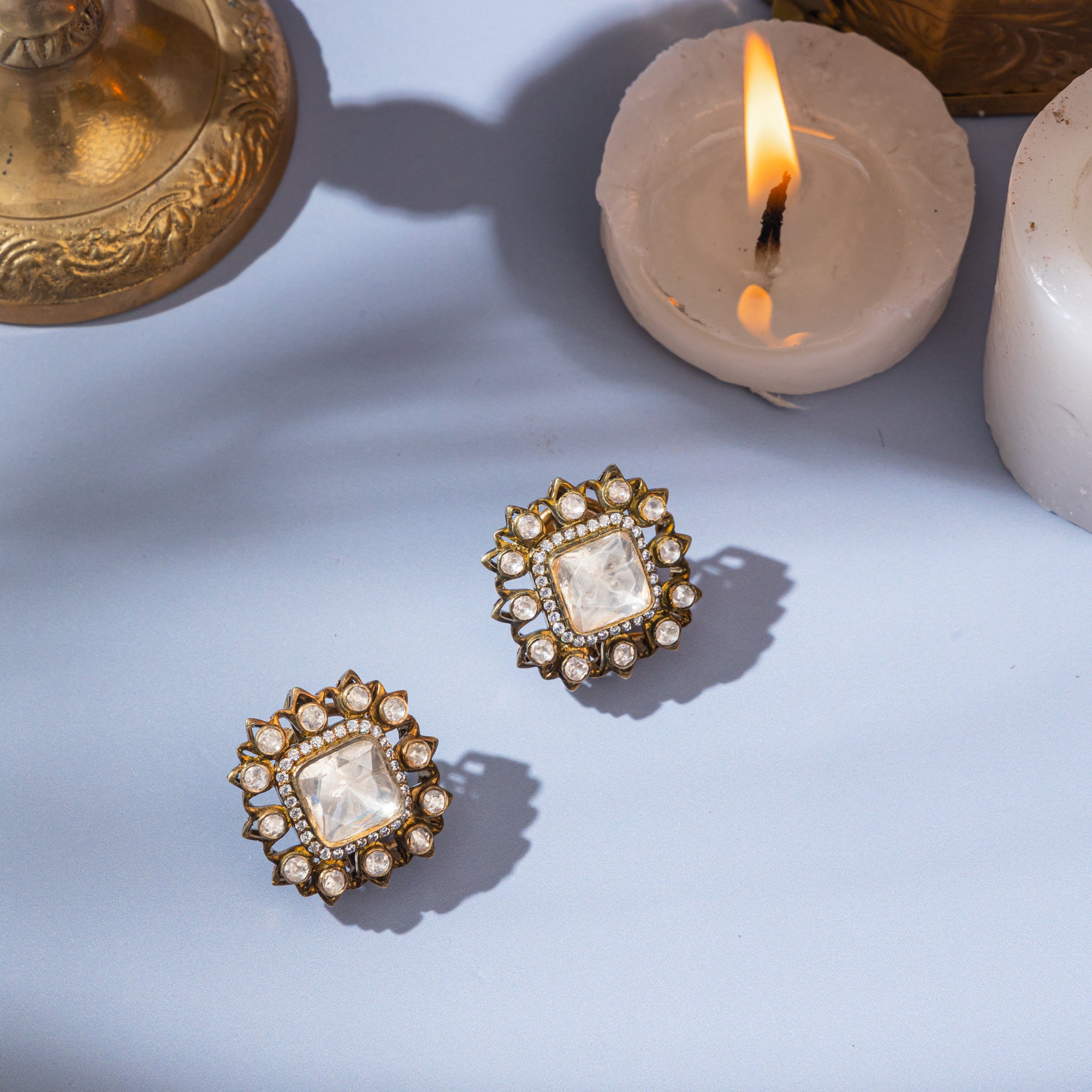 Square-shaped gold-plated stud earrings in a Victorian design featuring moissanite stones.