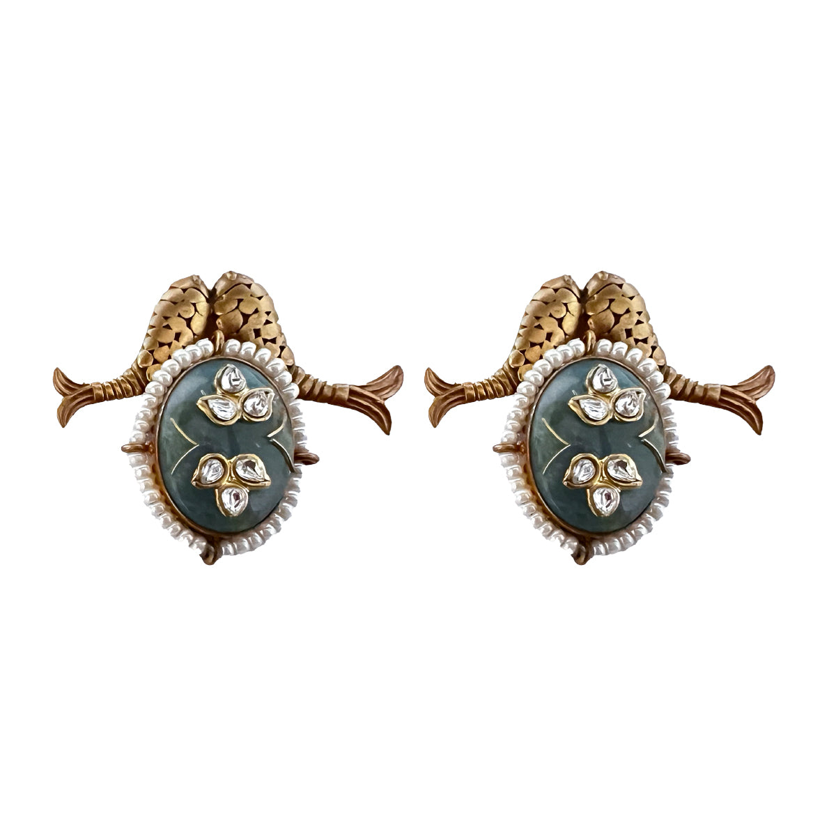 Silver fish stud earrings with antique gold plating, featuring dark green stones with polki detailing and pearl beading.